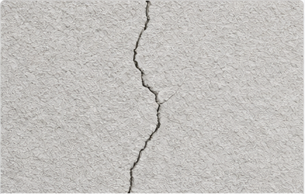 外壁にひび割れが見られる状態のイメージ